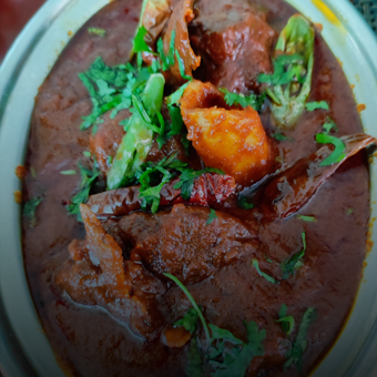 Laal Maas A specialty of Rajasthan. Lamb chunks cooked with special ingredients