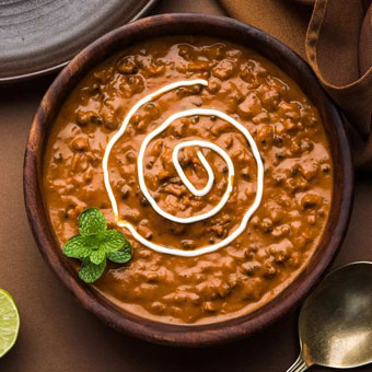 Dal Makhani Slow-cooked to royal perfection—Jaipur’s ultimate, velvety smooth Dal Makhani